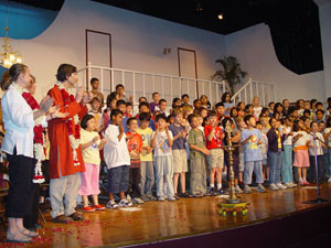 Richard Michelson (in long red kurta) is welcomed to American Embassy School, New Delhi India.